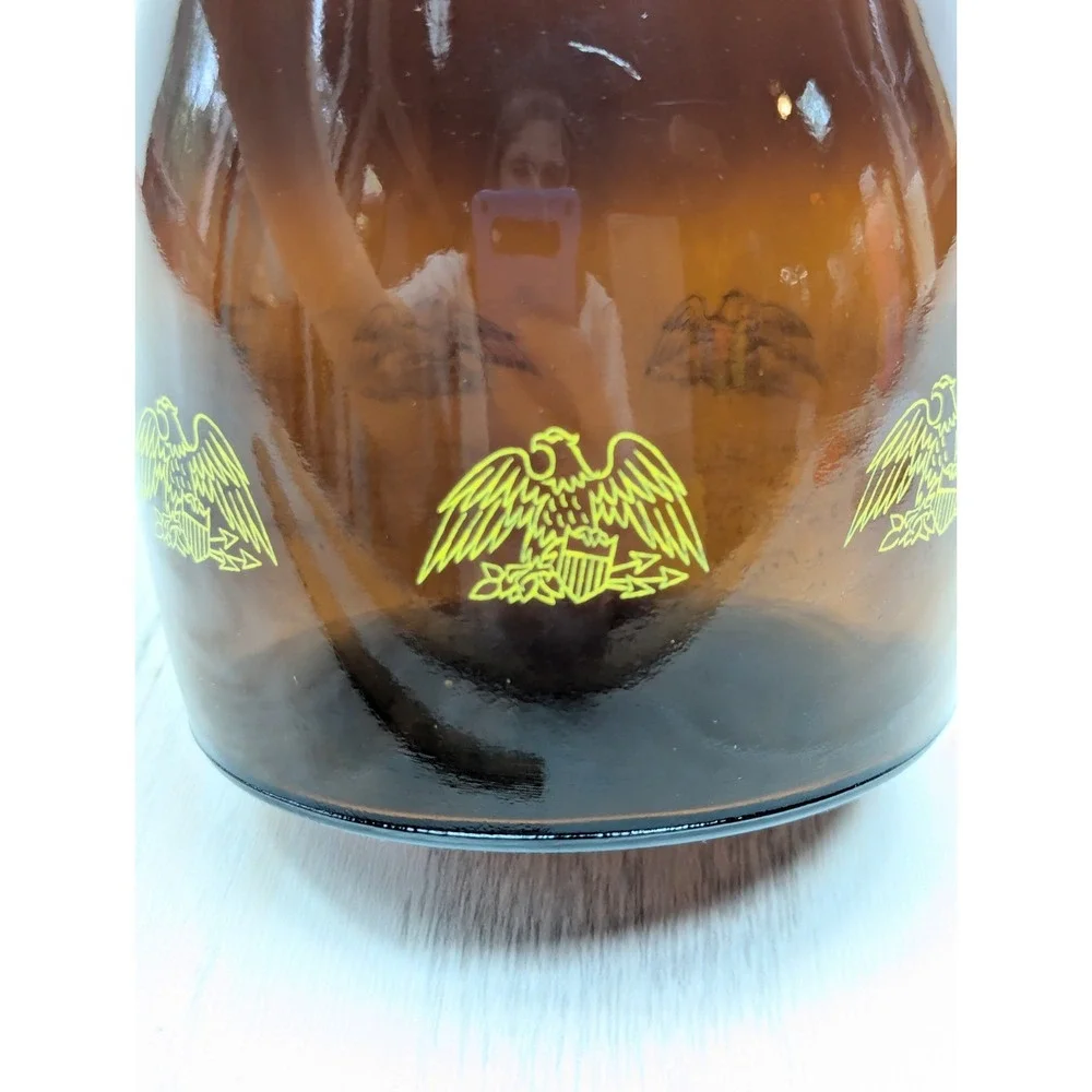 Log Cabin vintage syrup dispenser pitcher amber glass yellow lid patriotic eagle